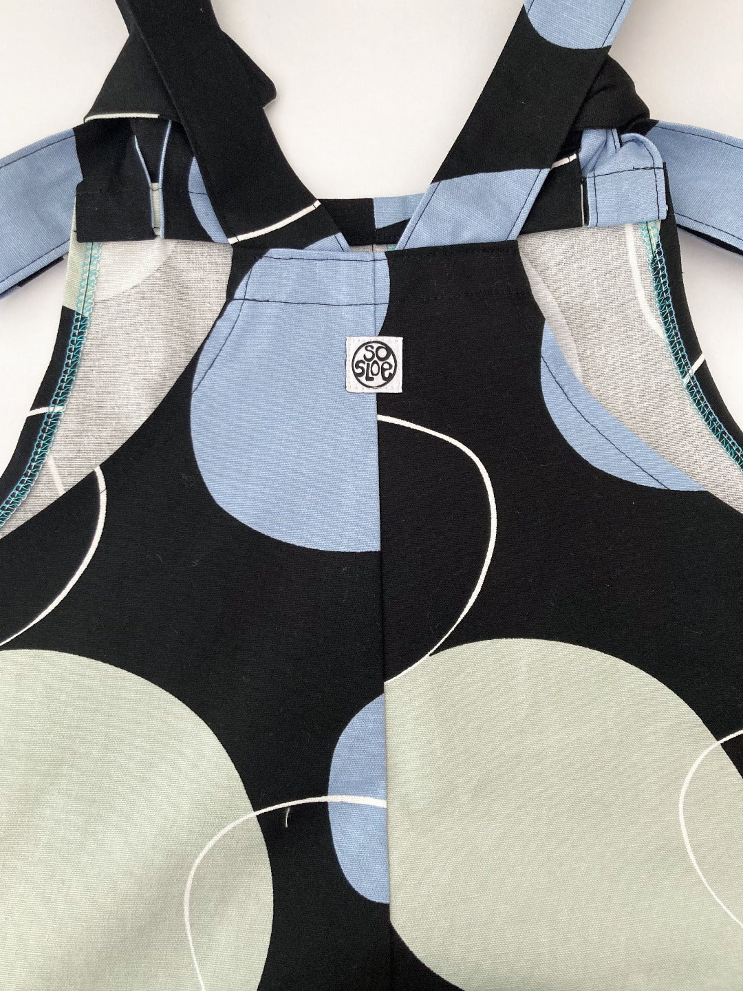 Black, green and blue cotton dungarees